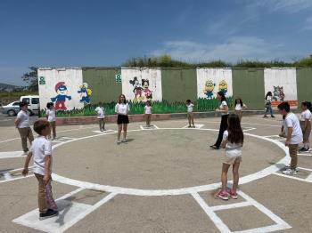 Future Teachers Touch Little Hearts with the "Life in the Garden" Project